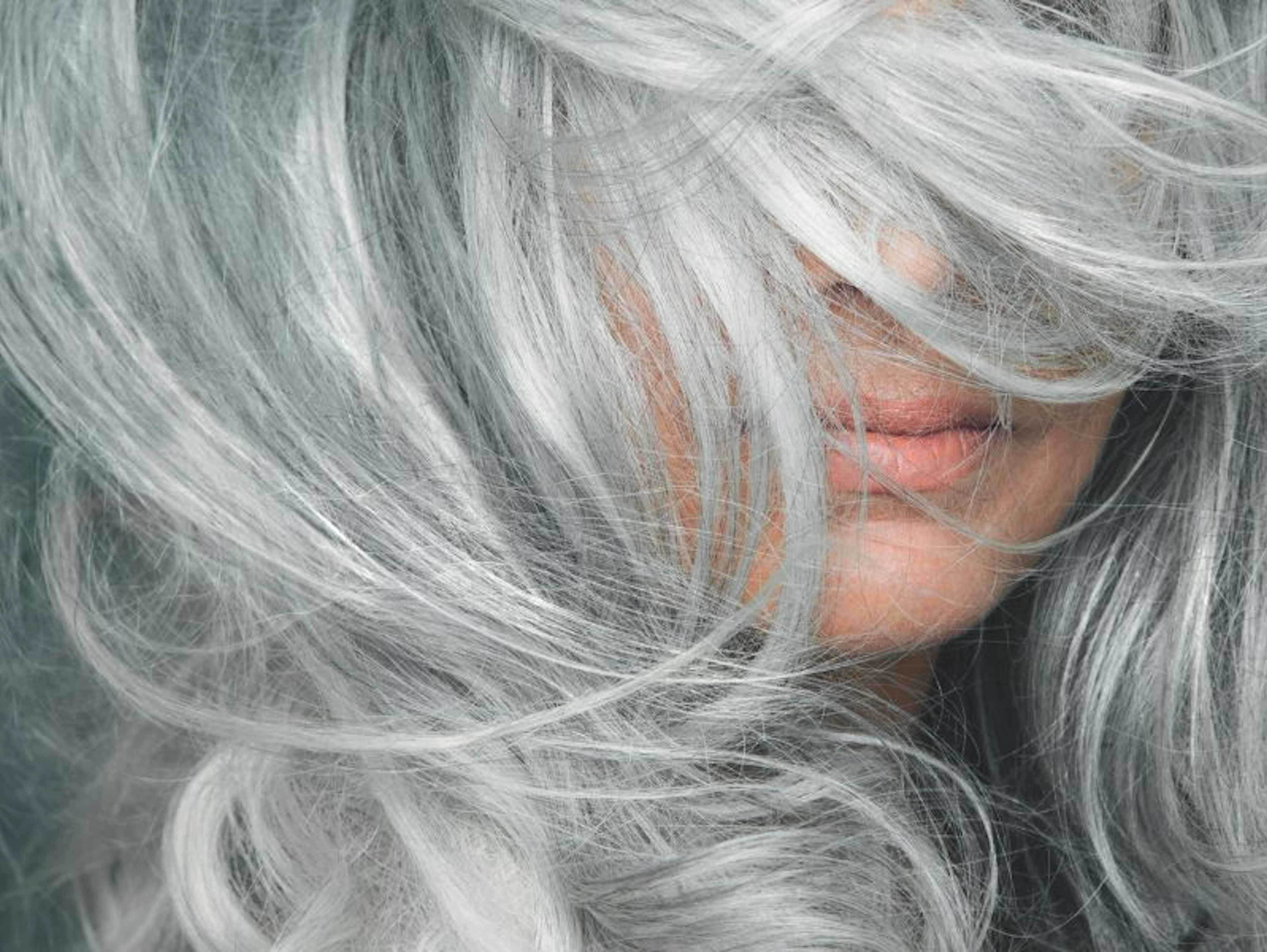 Woman with windblown gray hair