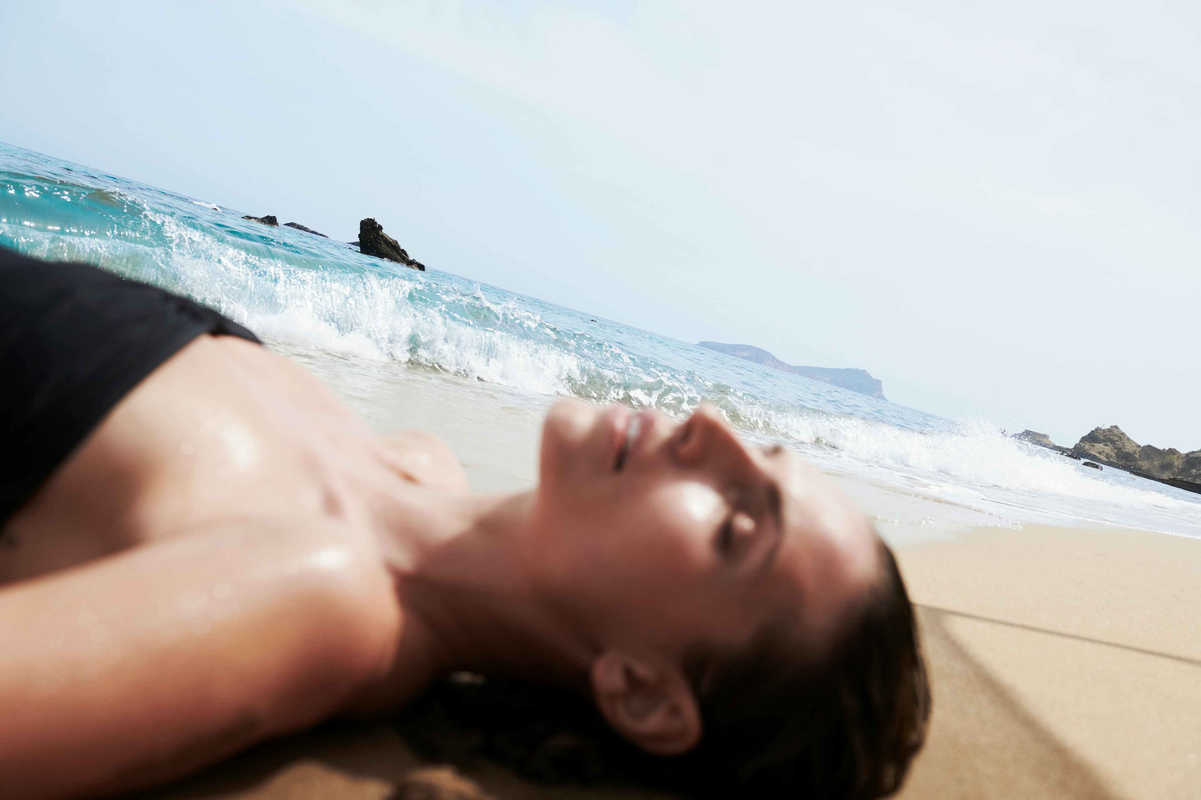 Woman relaxing on the beach